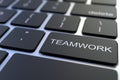 Close-up of TEAMWORK key on the keyboard. 3D rendering