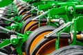 Close-up of technical units and mechanisms of agricultural machinery. Structural elements for tillage and harvesting Royalty Free Stock Photo