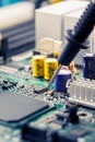 Close Up - Technician engineer measuring multimeter computer circuit board motherboard Royalty Free Stock Photo