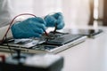 Close up of Technician measuring voltage electronic circuit board, Service after sale fix electric equipment