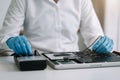 Close up of Technician measuring voltage electronic circuit board, Service after sale fix electric equipment