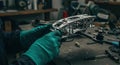 Close up of technician\'s hands assembling or repairing drone parts in a workshop.