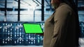 Close up of technician at work using green screen tablet in data center Royalty Free Stock Photo