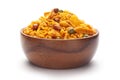 Close up of Teekha Meetha crunchy spicy Indian namkeen snacks In hand-made handcrafted wooden bowl