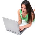 Close Up Of Teen With Funny Expression Working On Laptop