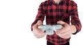 Close up of teenage boy hands playing video games holding a joystick console isolated over white background with copy space. Royalty Free Stock Photo