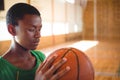 Close up of teenage boy looking at basketball Royalty Free Stock Photo