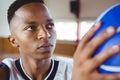 Close up of teenage boy practicing basketball Royalty Free Stock Photo