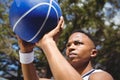 Close up of teenage boy practicing basketball Royalty Free Stock Photo