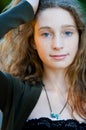 Close up of teenage girl with beautiful blue eyes