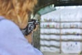 Close-up of teenage girl shooting training rifle at shooting range Royalty Free Stock Photo