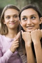 Close-up of teenage girl and younger sister