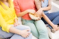 Close up of teenage girls eating popcorn at home Royalty Free Stock Photo