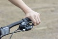 Close-up of a teenager`s hands on the handlebars of a Bicycle