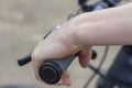 Close-up of a teenager`s hands on the handlebars of a Bicycle