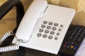 Close up of telephone device at office desk, communication technology concept Royalty Free Stock Photo