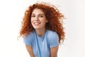 Close-up tender, romantic redhead woman lean towards camera silly and cute, smiling posing alluring and gentle, gazing