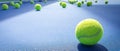 A close-up of the tennis ball on the court. The blue background is a beautiful illustration and background. Close-up shots of tenn