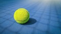 A close-up of the tennis ball on the court. The blue background is a beautiful illustration and background. Close-up shots of tenn Royalty Free Stock Photo