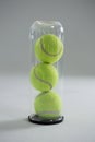 Close up of tennis ball in plastic bottle Royalty Free Stock Photo