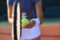 Close up of a tennis player hitting the ball with racket Royalty Free Stock Photo