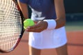 Close up of a tennis player hitting the ball with racket Royalty Free Stock Photo