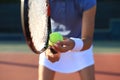 Close up of a tennis player hitting the ball with racket Royalty Free Stock Photo