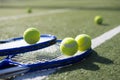 close up tennis rackets balls ground. High quality photo Royalty Free Stock Photo