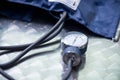 Close up of tensiometer over a metallic table, medical concept