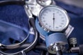 Close up of tensiometer over a metallic table with a stethoscope, medical concept