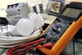 Close-up of electrical components and equipment on aged wooden background Royalty Free Stock Photo