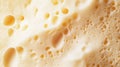 Close up texture of asiago cheese displaying sharpness and details for culinary design Royalty Free Stock Photo