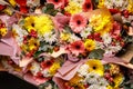 Close-up texture, background of flowers. Bouquet of flowers - gerbera, carnation, roses Royalty Free Stock Photo