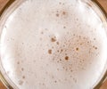 Close up texture of beer foam as background. Royalty Free Stock Photo