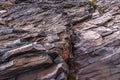 texture of brown and gray jagged rock wall Royalty Free Stock Photo