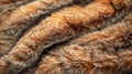 Close up Texture of Brown and Tan Striped Faux Fur Fabric Material for Background or Fashion Design Royalty Free Stock Photo