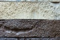 Close-up texture of a brown and white decorative scratched brick with a gap Royalty Free Stock Photo