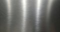 Brushed Metal Surface with Scratches and Highlight Royalty Free Stock Photo