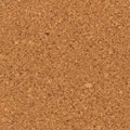 A close-up texture of a cork surface, featuring a uniform pattern of irregular, small Royalty Free Stock Photo