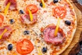 Close up texture of delicious sicilian pizza with bacon, olives