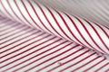 Close up texture fabric thin red line and white of shirt Royalty Free Stock Photo