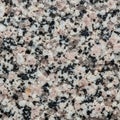 Close up texture of granite featuring a coarse grained composition Royalty Free Stock Photo