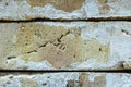 Close-up texture of a gray decorative scratched brick with a gap Royalty Free Stock Photo