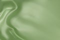 Close-up texture of light green silk. Light green fabric smooth texture surface background. Smooth elegant green silk in Sepia Royalty Free Stock Photo
