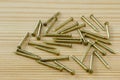 Close up texture of nails, Brass Nails on wooden board Royalty Free Stock Photo