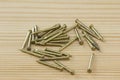 Close up texture of nails, Brass Nails on wooden board Royalty Free Stock Photo