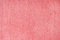 Close up texture of red coarse weave upholstery fabric. Decorative textile background Royalty Free Stock Photo