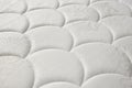 Close-up texture a new white mattress. Close-up. Template or mock up for design Royalty Free Stock Photo