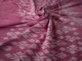 Close up of texture of pink color hand woven cotton fabric Royalty Free Stock Photo