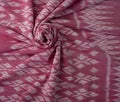 Close up of texture of pink color hand woven cotton fabric Royalty Free Stock Photo